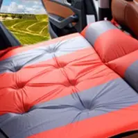 camping matress on the back of a car