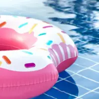 pink swimming tube in a pool